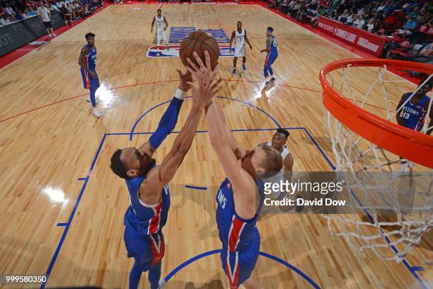 Bruce Brown and Henry Ellenson of the Detroit Pistons reach for the ball during the game against the Minnesota Timberwolves during the 2018 Las Vegas...