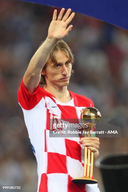 Luka Modric of Croatia poses with the FIFA Golden Ball for player of the tournament at the end of the 2018 FIFA World Cup Russia Final between France...