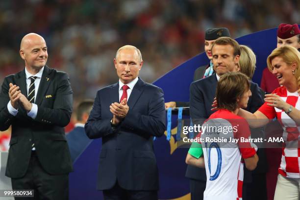 President Gianni Infantino and Russia's President Vladimir Putin look on at the trophy presentation at the end of the 2018 FIFA World Cup Russia...