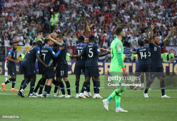 Players from the France team celebrate their victory following the FIFA World Cup final match in Moscow, Russia, on Sunday, July 15, 2018. President...