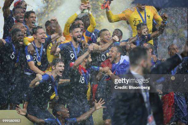 Players from the France team celebrate their victory following the FIFA World Cup final match in Moscow, Russia, on Sunday, July 15, 2018. President...
