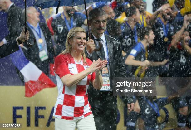 Kolinda Grabar Kitarovic, Croatia's president, applauds during the award ceremony following the FIFA World Cup final match in Moscow, Russia, on...