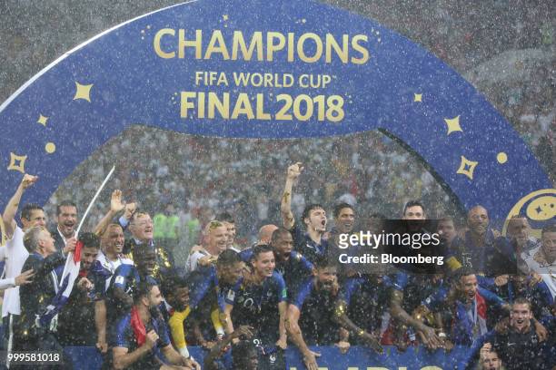 Players from the France team celebrate their victory following the FIFA World Cup final match in Moscow, Russia, on Sunday, July 15, 2018. President...