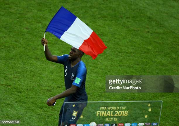 France v Croatia - FIFA World Cup Russia 2018 Final Samuel Umtiti celebrates with france flag at Luzhniki Stadium in Russia on July 15, 2018.