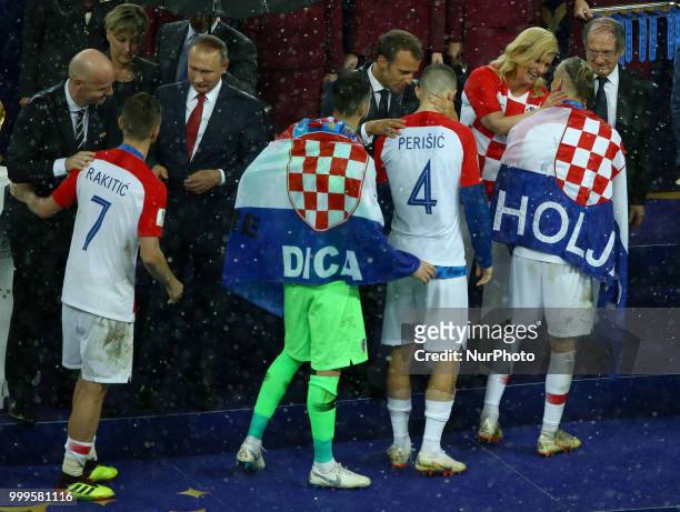 France v Croatia - FIFA World Cup Russia 2018 Final French President Emmanuel Macron on the stage with Fifa President Giovanni Infantino, Russian...
