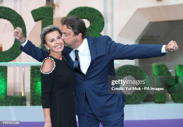 Former French tennis player Henri Leconte and his wife Florentine Leconte arrive at the Champions' Dinner at the Guildhall in The City of London.