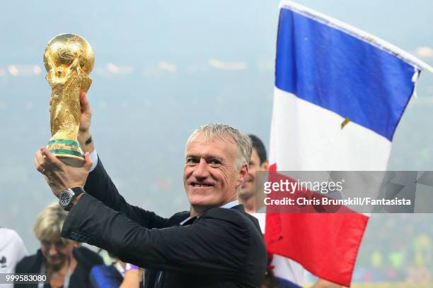 Head Coach of France Didier Deschamps celebrates with the World Cup trophy after the 2018 FIFA World Cup Russia Final between France and Croatia at...