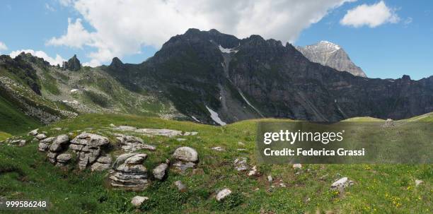 panoramic view of punta valgrande and monte leone, divedro valley - leone stock-fotos und bilder