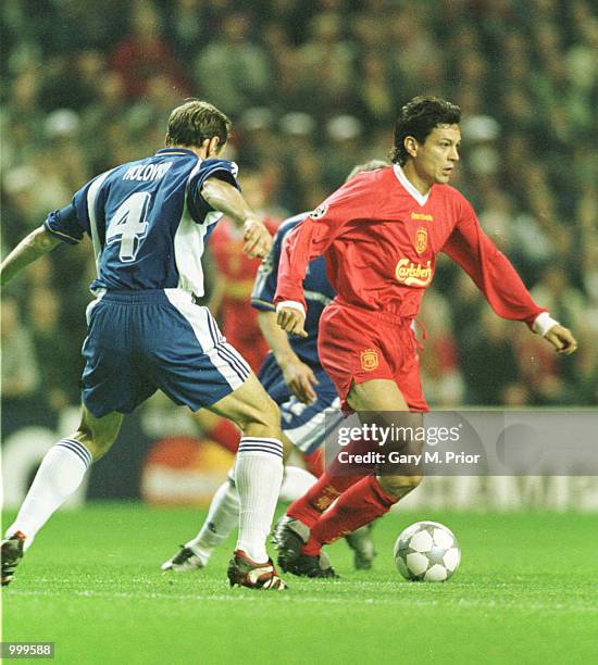 Jari Litmanen of Liverpool gets past Olexander Holovko of Kiev during the match between Liverpool and Dynamo Kiev in the UEFA Champions League Group...