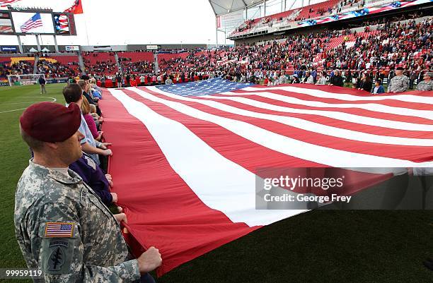 Large American flag is displayed at the start of the MLS soccer game between the Houston Dynamo and Real Salt Lake on May 13, 2010 in Sandy, Utah....