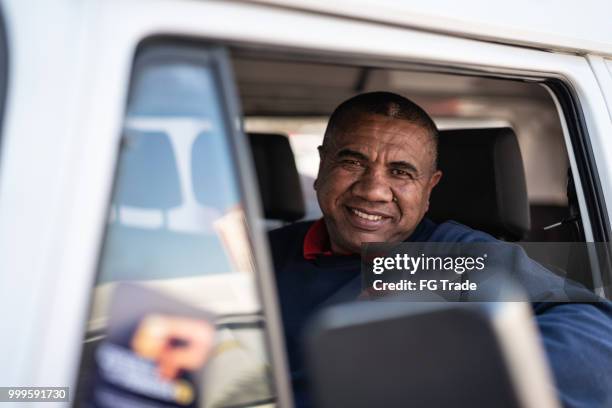 portrait of a driver - mini van driving stock pictures, royalty-free photos & images