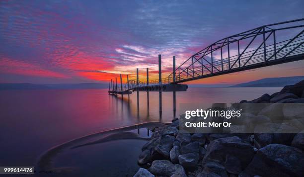 sunrise on the sea of galilee - mor stock-fotos und bilder