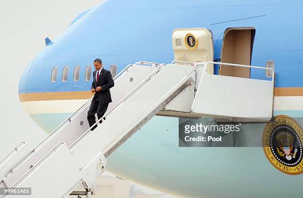 President Barack Obama disembarks Air Force One at Joint Base Andrews Naval Air Facility May 18, 2010 in Camp Springs, Maryland. Obama went to...