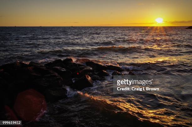 sunset at st kilda beach - kilda ストックフォトと画像