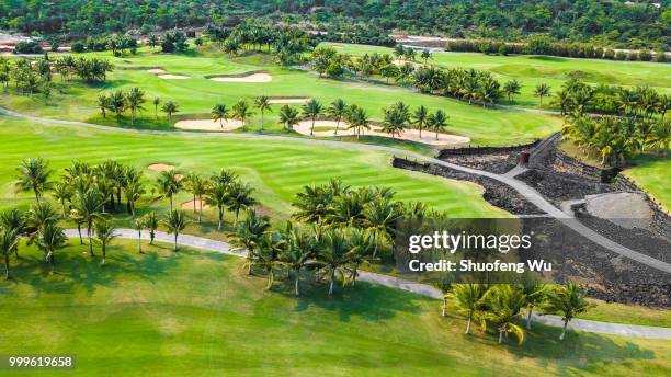 golf courses on volcanic relics - wu stock pictures, royalty-free photos & images