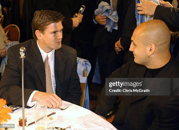 Matthew Gidley of the Knights and Michael Vella of the Eels chat during the NRL Grand Final Breakfast prior to this weekends NRL Grand Final match...