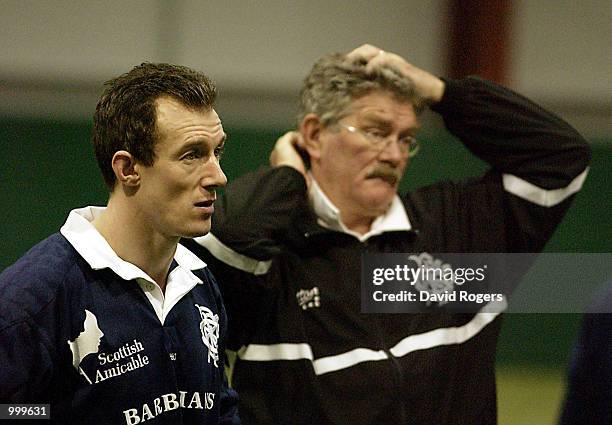 Bob Dwyer the Barbarian coach with his captain Rob Howley, take a break during Barbarian training at the WRU indoor arena, Cardiff. DIGITAL IMAGE....