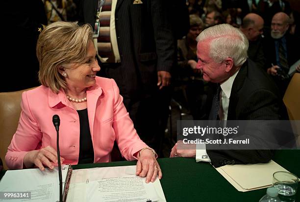 May 18: Secretary of State Hillary Rodham Clinton and Defense Secretary Robert M. Gates talk after the Senate Foreign Relations hearing with Joint...