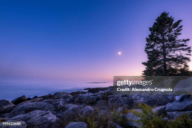 marshall point lighthouse sunset - sunset point stock pictures, royalty-free photos & images