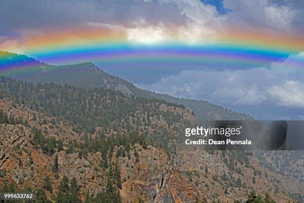 rainbow and cliffs - dean stock-fotos und bilder