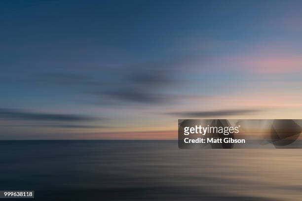 stunning long exposure landscape image of calm sea at st govan's - govan bildbanksfoton och bilder