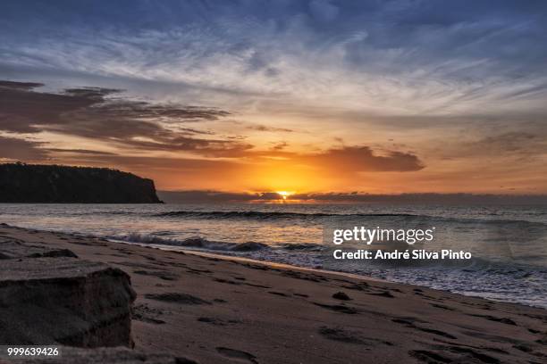 beautiful sunset at cabo ledo beach. angola. africa. - cabo stock pictures, royalty-free photos & images