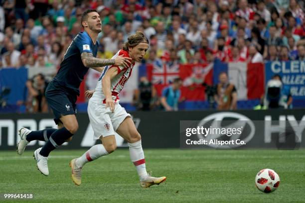 Luka Modric of Croatia is held during the 2018 FIFA World Cup Russia Final between France and Croatia at Luzhniki Stadium on July 15, 2018 in Moscow,...