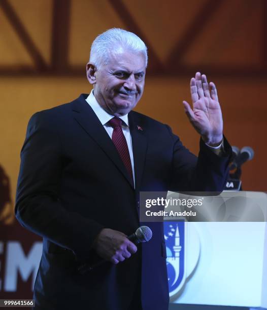 Turkish Grand National Assembly Speaker Binali Yildirim greets the crowd during the July 15 Democracy and National Unity Day events at July 15th...