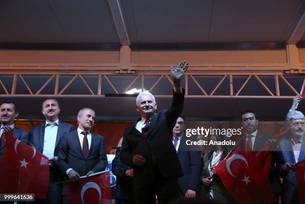 Turkish Grand National Assembly Speaker Binali Yildirim greets the crowd during the July 15 Democracy and National Unity Day events at July 15th...