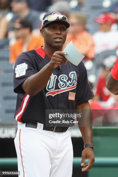 Manager Torii Hunter of the U.S. Team looks on before his team plays against the World Team in the SiriusXM All-Star Futures Game at Nationals Park...