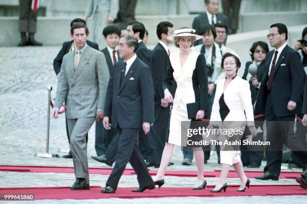 Prince Charles, Prince of Wales and Princess Diana, Princess of Wales attend the welcome ceremony with Japanese Prime Minister Yasuhiro Nakasone and...