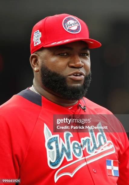 Manager David Ortiz of the World Team looks on before his team plays against the U.S. Team in the SiriusXM All-Star Futures Game at Nationals Park on...