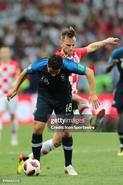 Forward Nabil Fekir of France National team in action with Midfielder Ivan Rakitic of Croatia National team during the final match between France and...