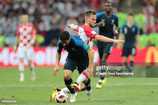 Forward Nabil Fekir of France National team in action with Midfielder Ivan Rakitic of Croatia National team during the final match between France and...