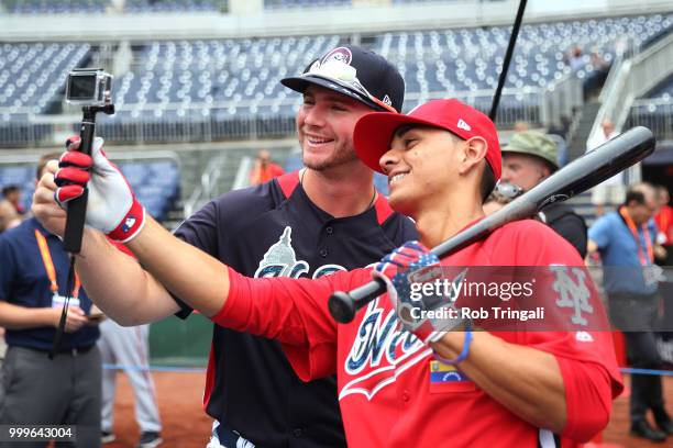 Mets prospects Peter Alonso of Team USA and Andres Gimenez of the World Team take a photo before the SiriusXM All-Star Futures Game at Nationals Park...