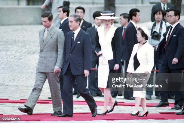 Prince Charles, Prince of Wales and Princess Diana, Princess of Wales attend the welcome ceremony with Japanese Prime Minister Yasuhiro Nakasone and...