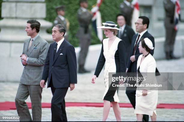 Prince Charles, Prince of Wales and Princess Diana, Princess of Wales attend the welcome ceremony with Japanese Prime Minister Yasuhiro Nakasone and...