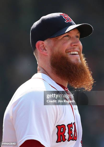 Craig Kimbrel of the Boston Red Sox smiles after he earned a save in a 5-2 win over the Toronto Blue Jays at Fenway Park on July 15, 2018 in Boston,...