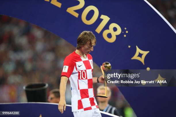 Luka Modric of Croatia walks off with the FIFA Golden Ball for player of the tournament at the end of the 2018 FIFA World Cup Russia Final between...