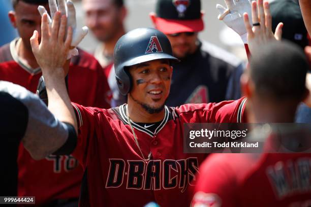 Jon Jay of the Arizona Diamondbacks celebrates after hitting a solo home run in the eighth inning of an MLB game against the Atlanta Braves at...