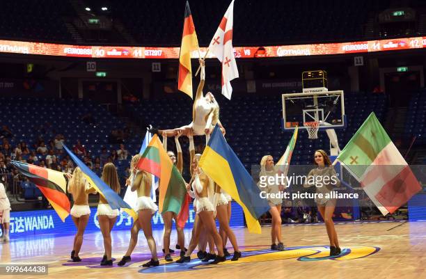 Cheerleaders with the teams' national flags before the EuroBasket 2017 Group B game between the Georgia and Germany at the Tel Aviv Arena, in Tel...