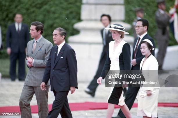 Prince Charles, Prince of Wales and Princess Diana, Princess of Wales attend the welcome ceremony with Japanese Prime Minister Yasuhiro Nakasone and...