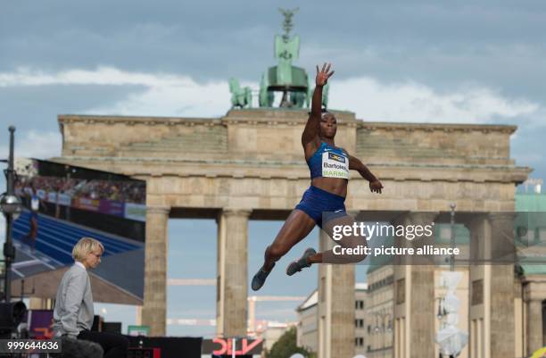 Long jumper Tianna Bartoletta in action in front of the Brandenburg Gate during the German Athletics Association international competition "Berlin...