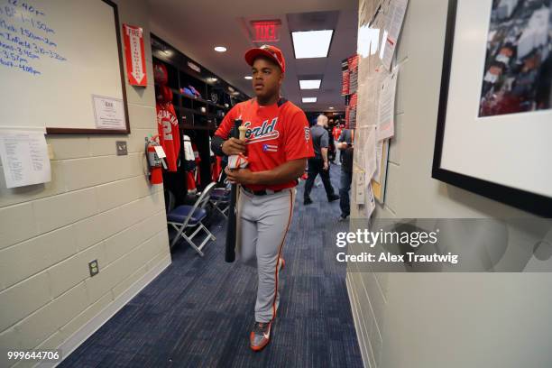 Heliot Ramos of the World Team heads to the field prior to the SiriusXM All-Star Futures Game at Nationals Park on Sunday, July 15, 2018 in...