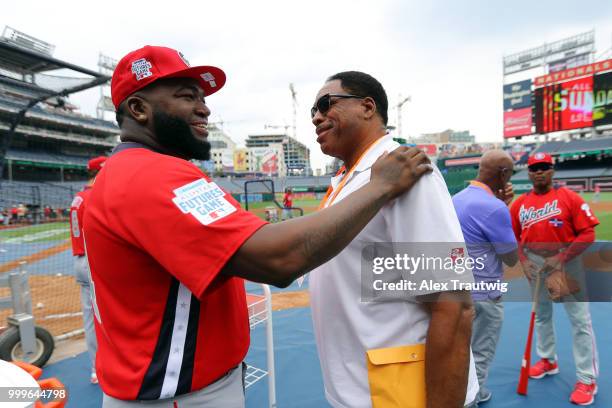 David Ortiz of the World Team talks with Hall of Fame Dave Winfield during batting practice prior to the SiriusXM All-Star Futures Game at Nationals...