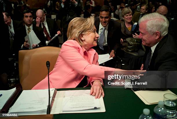 May 18: Secretary of State Hillary Rodham Clinton and Defense Secretary Robert M. Gates talk after the Senate Foreign Relations hearing with Joint...