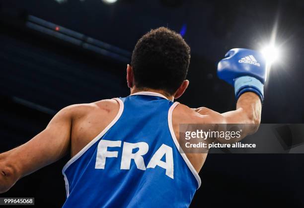Sofiane Oumiha of France celebrates after winning the lightweight final bout of the AIBA World Boxing Championships in Hamburg, Germany, 2 September...