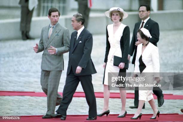Prince Charles, Prince of Wales and Princess Diana, Princess of Wales attend the welcome ceremony with Japanese Prime Minister Yasuhiro Nakasone and...