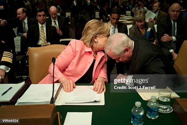 May 18: Secretary of State Hillary Rodham Clinton and Defense Secretary Robert M. Gates talk after the Senate Foreign Relations hearing with Joint...