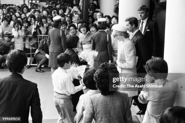 Prince Charles, Prince of Wales and Princess Diana, Princess of Wales are seen after visiting Kabukiza Theatre on May 12, 1986 in Tokyo, Japan.